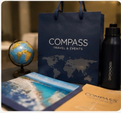 Material de Compass en feria